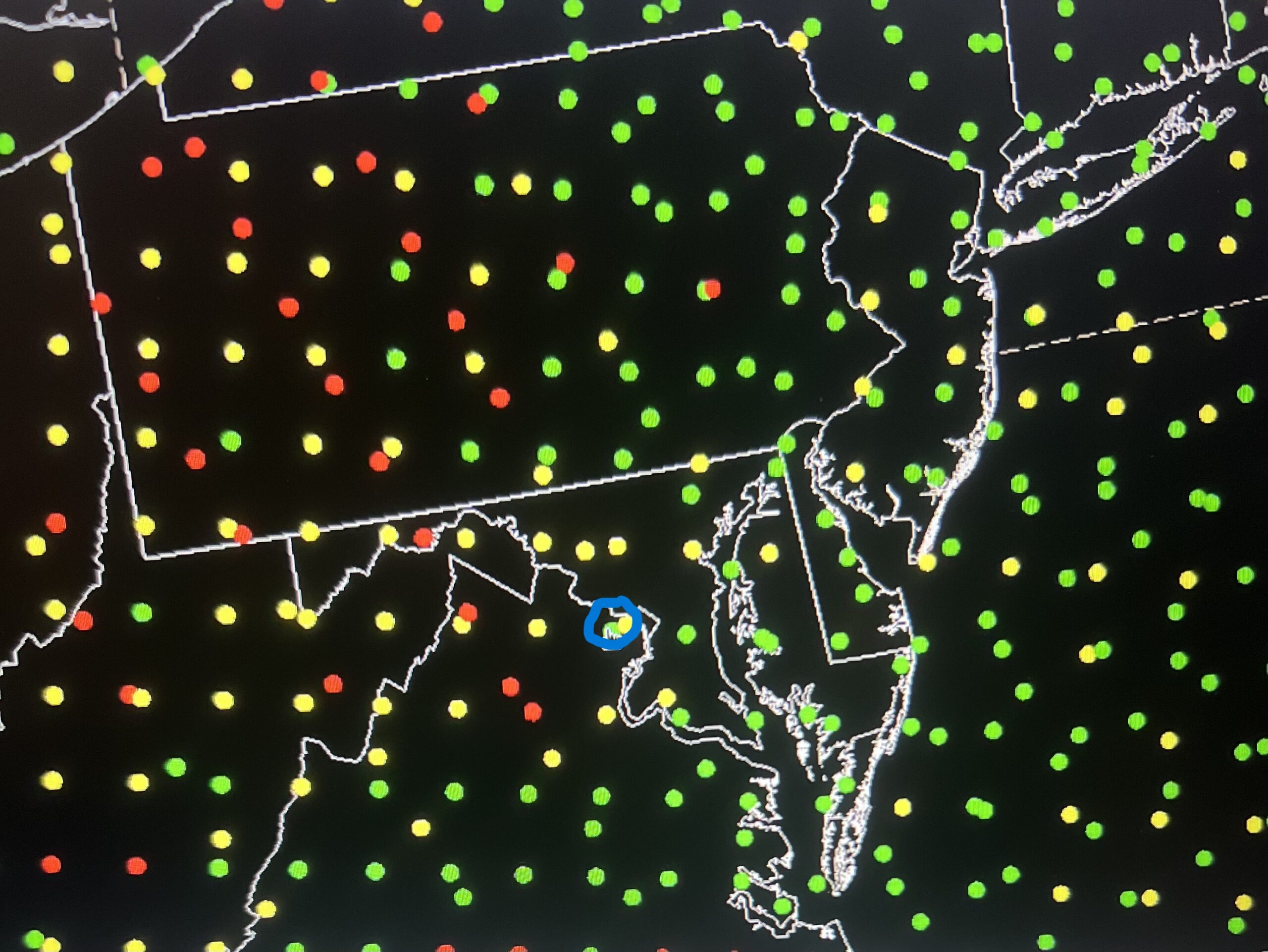 Figure 3: NUCAPS Sounding Availability at ~1500 UTC 01 July 2025, with the area of interest circled. The color of the dots represent the data quality due to cloud cover, with the green dot representing good-quality data with little to no cloud cover. This image was exported from AWIPS.